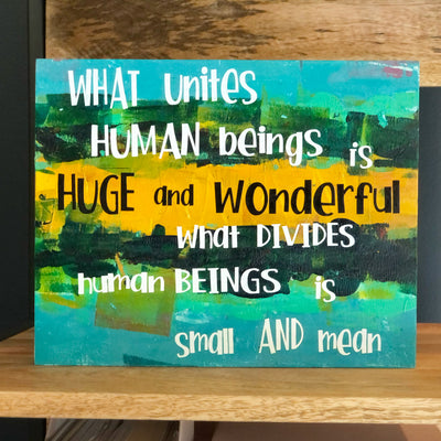 what unites human beings - wood panel art