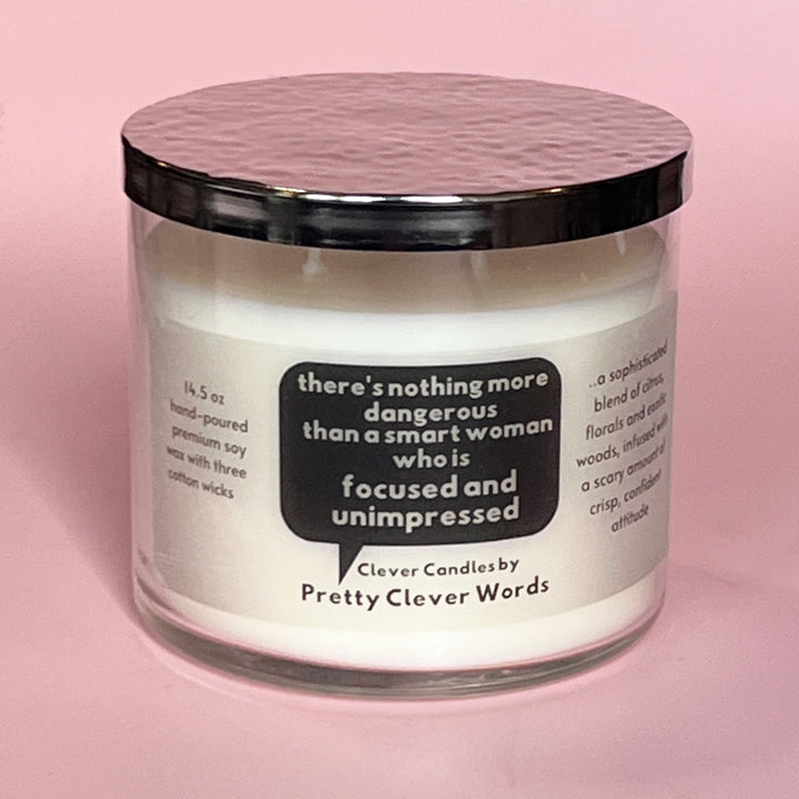 nothing is more dangerous than a smart woman, said in a word bubble - grey sophistication candle