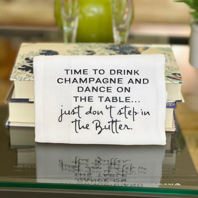 drink champagne, don't step in the butter - humorous bar kitchen towel SM