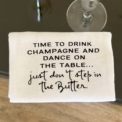 drink champagne, don't step in the butter - humorous bar kitchen towel SM