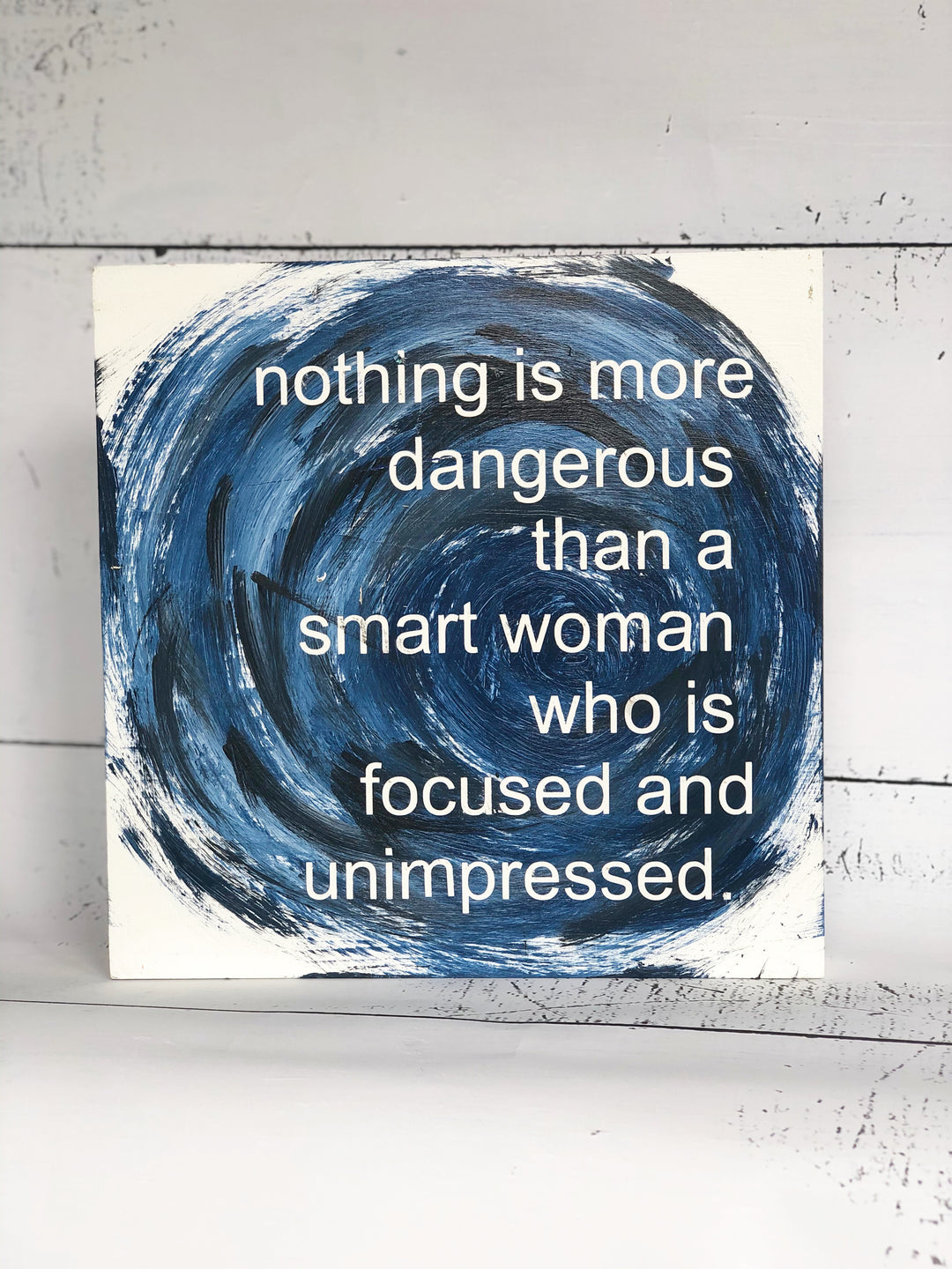 nothing is more dangerous than a smart woman - wood panel art