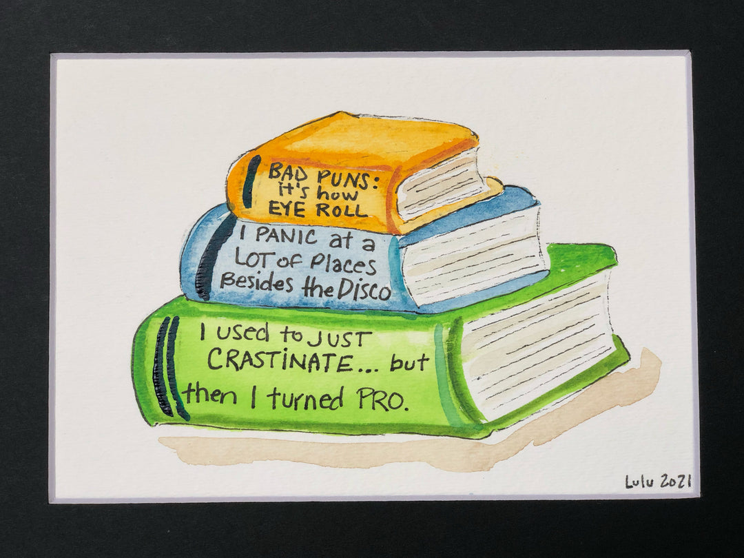 an original painted watercolor piece with three books in colors of burnt yellow, celery green and faded cerulean blue