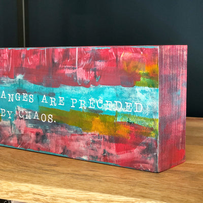 all great changes are preceded by chaos - wood panel art