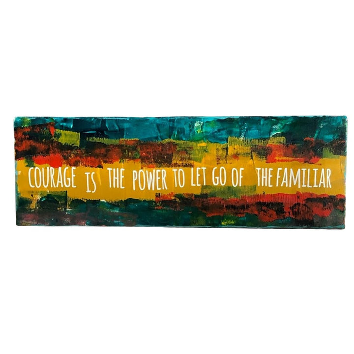courage is the power to let go of the familiar - wood panel art