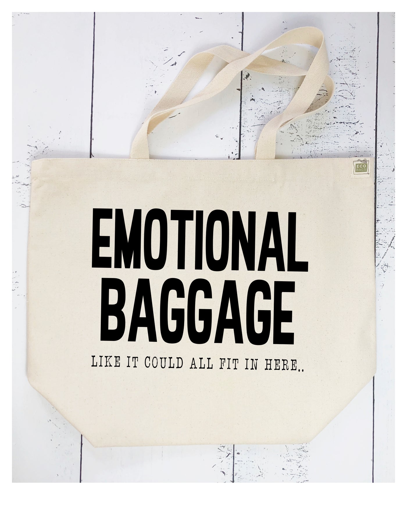canvas tote bag with the words, Emotional Baggage, like it could all fit in here..