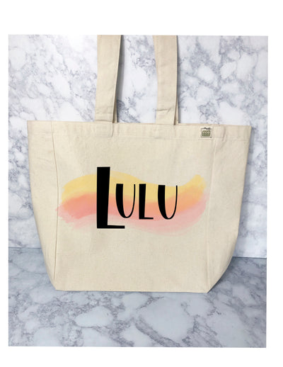 sample of a canvas tote bag with handles. it's ready to be customized for you.