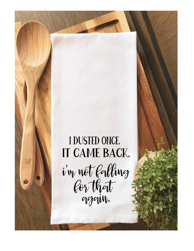 a white cotton kitchen towel with the words, "I dusted once. It came back. I'm not falling for that again."