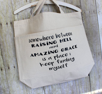 raising hell and amazing grace - tote bag - Pretty Clever Words