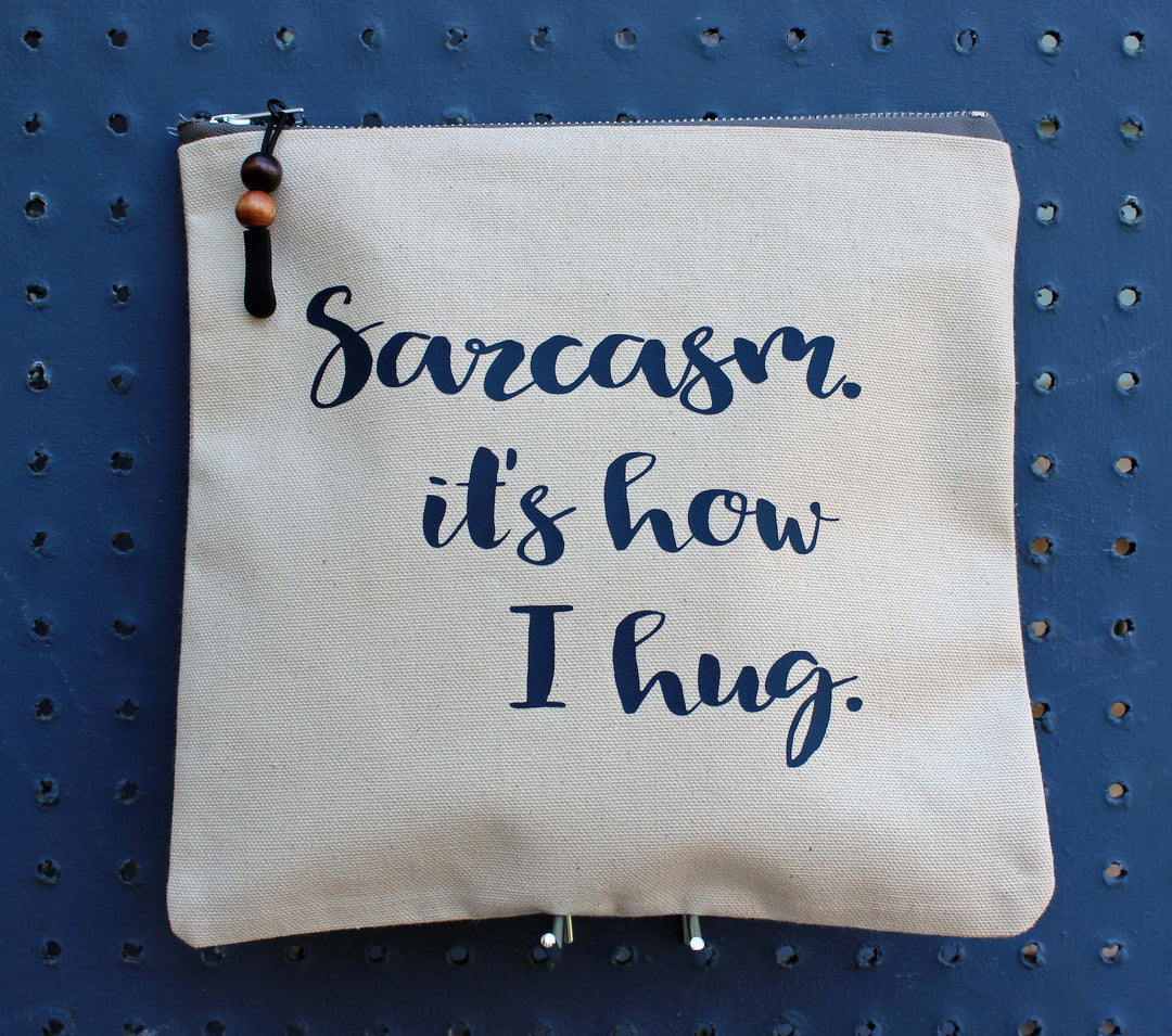 sarcasm, it's how i hug - zip bag tote - Pretty Clever Words
