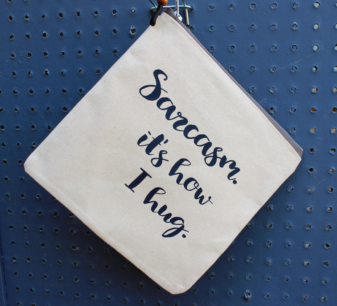 sarcasm, it's how i hug - zip bag tote - Pretty Clever Words